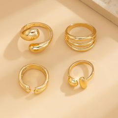 4-Piece Polished Liquid Metal Textured Ring Set